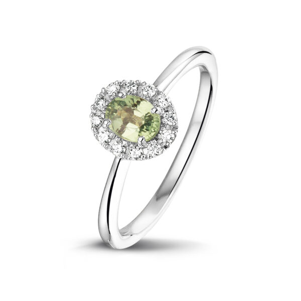 wit gouden ring met diamanten en groene saffier