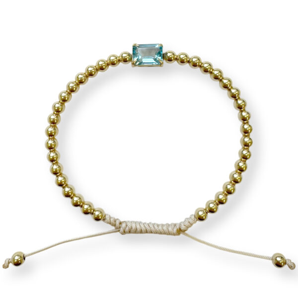 geel gouden bolletjes armband met topaas